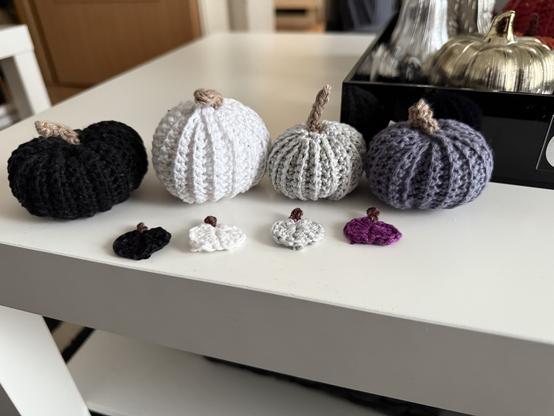 8 Crochet Pumpkins in different colors and sizes