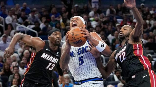 Magic beat Heat 125-121 in NBA season opener