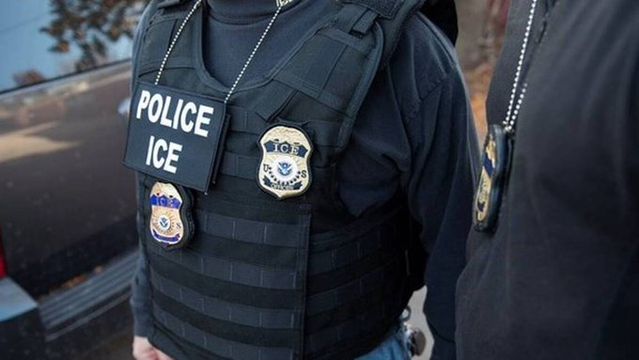 Florida police an ICE agents working together, image shows to agents with "Police ICE" on their vests: