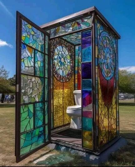 a beautiful porta-potty made entirely of stained glass