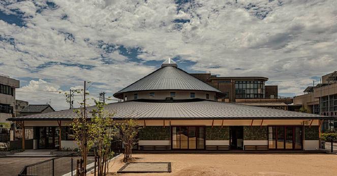 curved wooden frame shapes light-filled daycare center in japan
