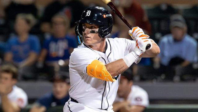 Kevin McGonigle batting from the left side. He is wearing a white Tigers home uniform.