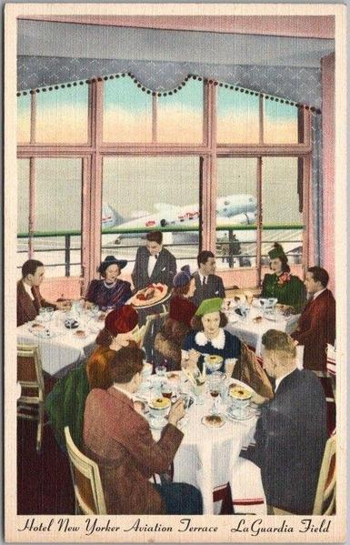 This charming vintage postcard titled Hotel New Yorker Aviation Terrace – LaGuardia Field captures a glamorous scene from the golden age of air travel in the early 1940s. Inside the elegant Aviation Terrace restaurant, well-dressed diners enjoy a refined meal under soft pink lighting, their tables adorned with white linens and fine china. Beyond the large picture windows, a gleaming aircraft bearing the TWA logo sits on the tarmac—symbolizing the thrilling modernity of air travel.

The composition beautifully balances sophistication and excitement: aviation as both spectacle and luxury. The guests, dressed in stylish coats and hats, embody the optimism of an era when flight represented the height of progress and possibility. Restaurants like this one at LaGuardia Field offered patrons a front-row seat to the new world of commercial aviation, where travelers and spectators alike could dine while watching sleek airliners take to the sky.

Produced in the classic linen-postcard style by Curt Teich & Co., this piece captures not just a location but a moment in cultural history—when dining beside the runway was a novelty and flying still carried the allure of adventure and exclusivity.
