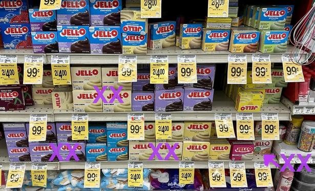 3 rows of grocery store shelves with 10 pudding mix boxes across each shelf, maybe 24 flavor options. Purple X’s mark those I can select. There are only 3 choices because the vast majority of these are “instant” pudding mixes. And, they are all the Jello brand.