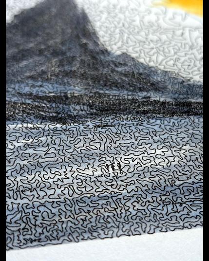 A tundra landscape rendered in continuous curving black linework on white paper, featuring a prominent mountain peak on the left, rolling hills, and a hand-painted yellow-orange sun in the upper center. The sky is filled with dense, maze-like patterns of curved lines, while the ground and water areas are hand-colored in cool blue-grey tones. The entire composition is created from a single unbroken curving line that travels through the entire piece, creating organic, flowing texture throughout.