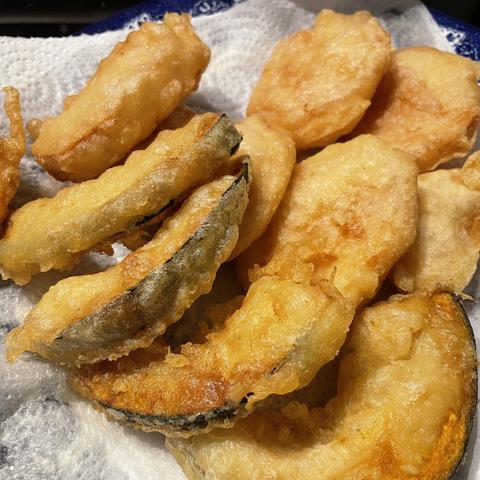 Photo: Kabocha to satsuma imo tempura - Japanese style battered and fried culinary squash and sweet potato on a plate