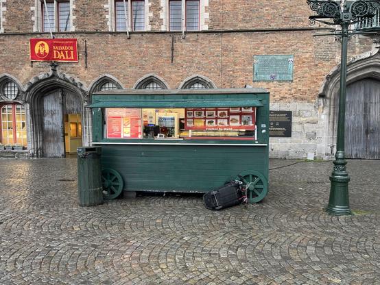 Typical green cart selling fried food in Brugge