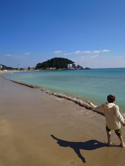 My boy playing with the sand in Seongjong beach