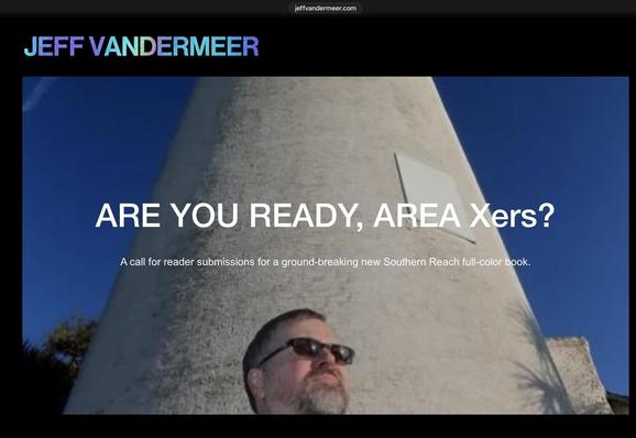 A color photo of science fiction author Jeff VanderMeer wearing sunglasses, standing in front of a tall white lighthouse. Two lines of text stretch across most of the photo, floating above his head:

ARE YOU READY, AREA Xers?
A call for reader submissions for a ground-breaking new Southern Reach full-color book.