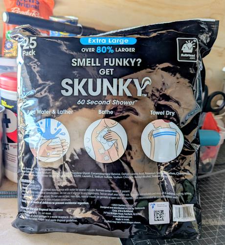 A photo of a package that reads "Smell funky? Get skunky."