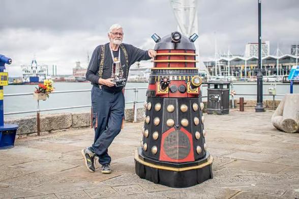 Portsmouth inventor Lee Adams with the music-playing Dalek he built.