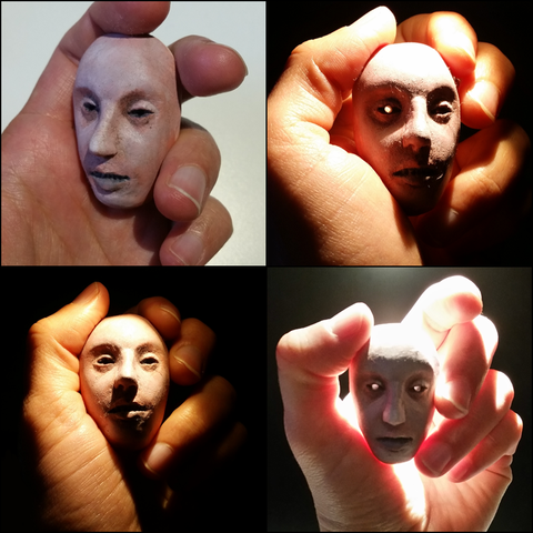 Four photos of a hand holding a doll face. The photos are in different lights, with a couple of them making one or both eyes of the doll face shine ominously from inside.