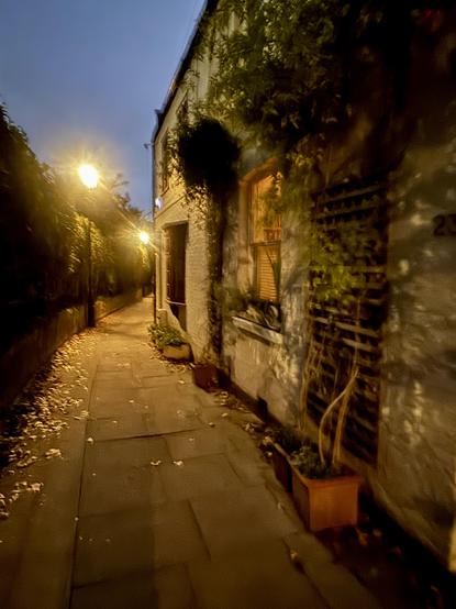 Alley bathed in yellow light.