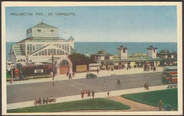 Printed colour postcard showing a view of the Wellington Pier at Great Yarmouth in Norfolk.

Publisher not stated, not numbered.

Postally used on 12 May 1953 with Great Yarmouth cancellation on two blue 1d stamps and sent to Mr Young, 12 Leighton Road, Hove, Sussex.

Good condition, with slight corner bumps, but small crease to bottom left corner and tiny knock to bottom right corner.