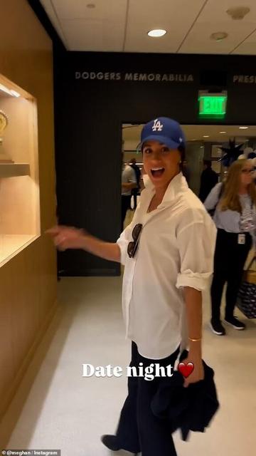 Despite Prince Harry's sharing his concerns, saying: 'Social media is taking young men and young boys into very dark places, which should concern all of us,' his wife took to social media platform Instagram posting a story of the pair together at a Dodger's game