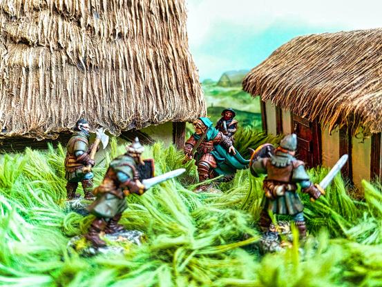 Talæn confronts a group of thugs in a village in the human kingdoms.