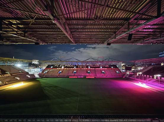 Foto des nächtlichen Millerntors, Blick auf die Gegengerade: "Kein Fussball den Faschisten!"