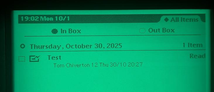 A screenshot of a backlit Apple Newton "in box" showing a read email has arrived.
Black text on glowing green.