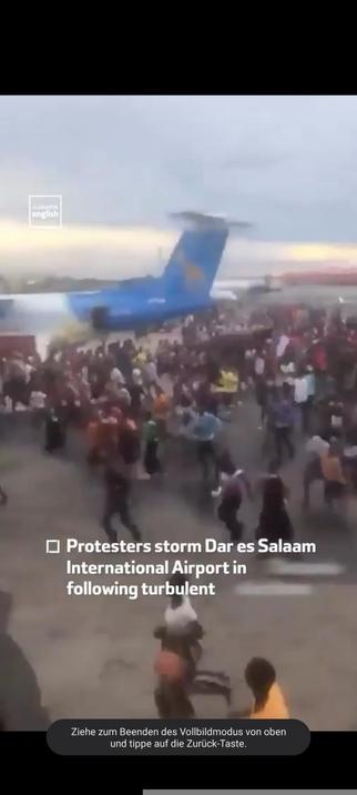 People running on a airplane field