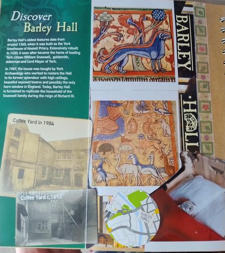 A leaflet from barley hall, and two photos of medieval animal drawings. I think they are dogs but they are blue and don't really look like dogs