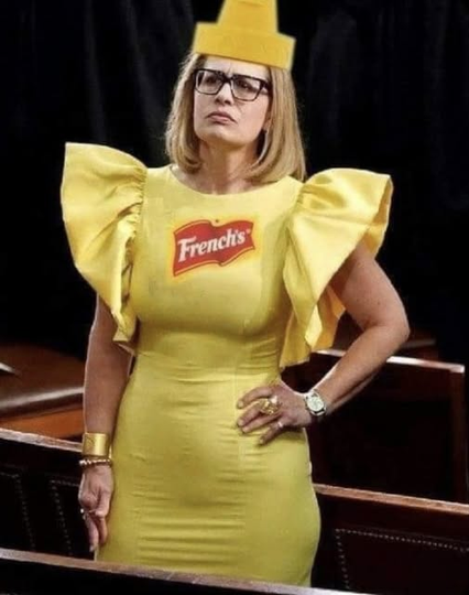 Kyrsten Sinema in a yellow dress with a mustard cap hat on and the word French's on it 
Best #Halloween costume by a standing Senator, 2023 
#KyrstenSinema #Sinema