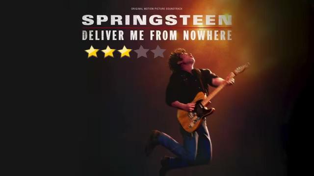 movie poster for Springsteen: Deliver Me From Nowhere showing a man jumping up with knees bent holding a guitar