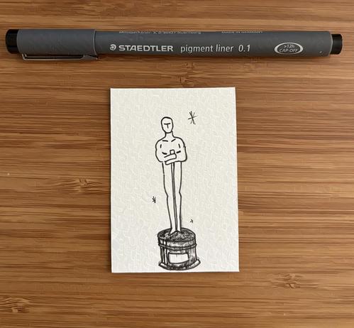 A drawing of an Oscar award