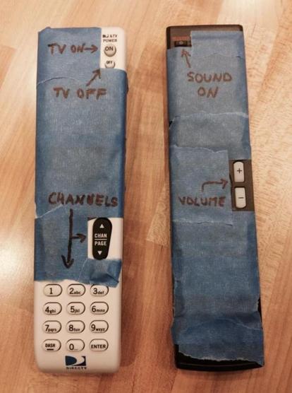 two tv/vcr remotes with most of their buttons taped except on/off, sound control and channels navigation