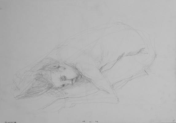 Drawing portrait of a female art model lying on the floor, naked