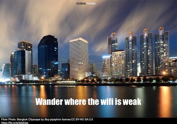 A flickr image of the bancock night skyline, Text "Wanter Where the WiFi is week" in impact font