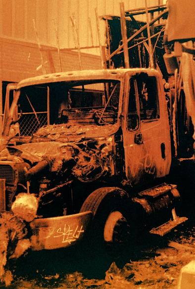 Redscale image of a box truck that has suffered a catastrophic fire.

📷️ Olympus Pen F
🎞️ Harman RED 125