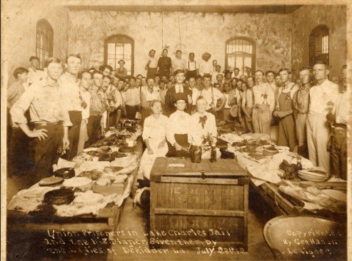 Grainy black and white image of jailed union members in the wake of the Grabow massacre.
