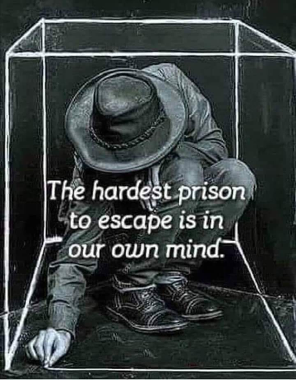 Picture in black and white. A guy is closing himself in a drawn cube around himself. The text reads: "The hardest prison to escape is in our own mind."