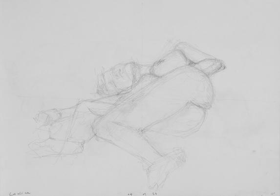Drawing portrait of a female art model lying naked on the floor