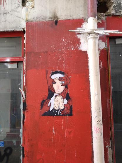 A collage of a nun on a red well with 5 hands grabbing her head, neck and arms, wider view. The red, white & black from the drawing echo the red wall, white drain and black stains.