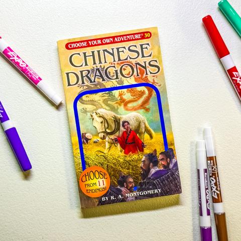The image features the book "Chinese Dragons," part of the "Choose Your Own Adventure" series. The cover depicts a scene with a young boy in a red outfit, a horse, and several dragons in the background.
