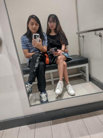Mirror selfie with my GF, sitting in a dressing room lol
