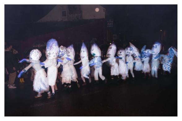 The turnip heads parading through the rain.