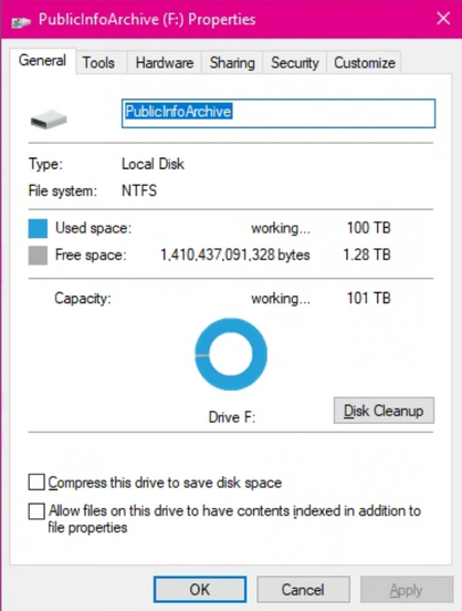 This image is a screenshot of the "Properties" window for a local disk in the Windows operating system.

The window is titled **"PublicInfoArchive (F:) Properties"**. The **"General"** tab is selected.

The contents of the "General" tab show:
* **Drive Label:** PublicInfoArchive
* **Type:** Local Disk
* **File system:** NTFS

A circular donut chart in the center, labeled "Drive F:", visually represents the disk space. It is almost entirely blue, indicating the drive is nearly full.

The storage statistics are listed as:
* **Used space:** "working..." and **100 TB**
* **Free space:** 1,410,437,091,328 bytes (which is **1.28 TB**)
* **Capacity:** "working..." and **101 TB**

The text "working..." next to "Used space" and "Capacity" suggests the system is still calculating the exact values.

Below the storage information, there is a "Disk Cleanup" button.

At the bottom are two checkboxes, both of which are **unchecked**:
* "Compress this drive to save disk space"
* "Allow files on this drive to have contents indexed in addition to file properties"

The window concludes with three buttons at the very bottom: "OK", "Cancel", and a grayed-out "Apply" button.