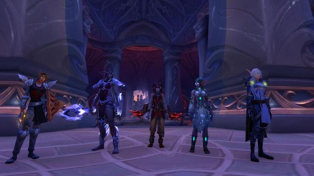 My character stands in the center, with two elves on either side. To her left, which would be your right, the Night Elf High Priestess of Elune; Tyrande Whisperwind. To her right and your left, the Nightborne/Nightfallen First Arcanist Thalyssra. On either side of them...honestly...I am drawing a blank on their names. I was blasting through the story, and they just look like generic Blood Elves/High Elves. I can't even tell from the armor. Someone halp? Haha.