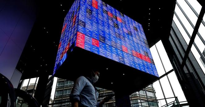 午前の日経平均は反落、エヌビディア決算前で手控え　テーマ株は物色 | ロイター