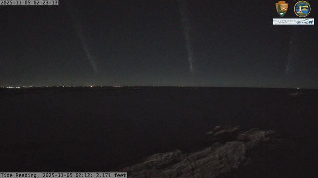 Camera looking north from Boston Light on Little Brewster Island. View looks toward the northern approaches into Boston Harbor, with Graves Light visible into the distance. The smaller Brewster Islands, Middle and Outer, are in the midground, with the Shag Rocks on the near right.