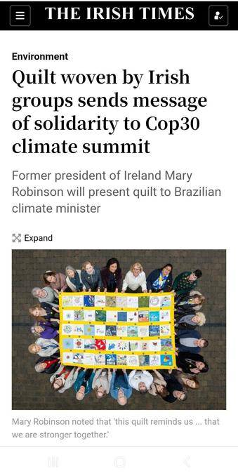 Irish Times article "Quilt woven by Irish groups sends message of solidarity to Cop30 climate summit, with image of people holding a quilt