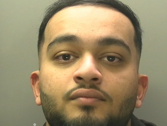 Mugshot of Mohammed Raihan, a 22‑year‑old Swansea student sentenced to 15 years in prison for child sex offences.