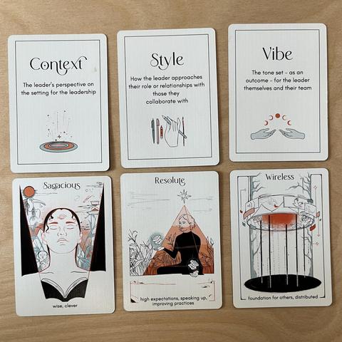 Six cards are shown from the Leadership Tarot deck. The text on the six cards is as follows in order from top left to bottom right. 
Context - the leader’s perspective on the setting for the leadership 
Style - How the leader approaches their role or relationships with those they collaborate with 
Vibe - The tone set - as an outcome - for the leadership themselves and their team
Sagacious - wise, clever
Resolute - high expectations, speaking up, improving practices
Wireless - foundation for others, distributed