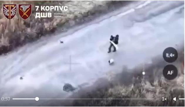 Screen grab shows a civilian carrying a white flag and walking a dog near Kruhliakivka in Kharkiv Oblast shortly before the attack on Nov. 3, 2025 according to the 77th Airmobile Brigade