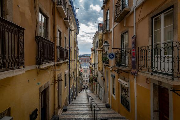 looking down the beco dos aciprestes in lisbon