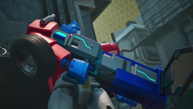 Optimus Prime hiding out with a large program-generated weapon in the Cyber City on Transformers: CYBERWORLD.