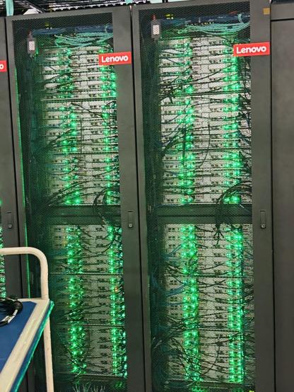 More pretty green lights! A couple of rack units with lots of happy little drives, churning away on goodness knows what.