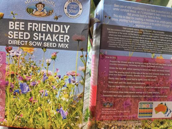 Two boxes of “bee friendly” seeds. They contain: 

Calendula (Calendula officinalis)
Cornflower (Centaurea cyanus)
Californian Poppy (Eschscholzia californica)
Fineflower (Gilia leptantha)
Toadflax (Linaria maroccana)
Alyssum (Lobularia maritima)
Wallflower (Erysimum cheiri)
Nemophila (Nemophila menziesii)
Poppy (Papaver rhoeas)
Marigold African (Tagetes erecta)
Chinese Forget-Me-Not (Cynoglossum amabile)
Borage (Borago officinalis)
Evening Primrose (Oenothera pallida)
Lavender (Lavandula angustifolia)
Native Violet (Viola hederacea)
Swan River Daisy (Brachycome iberidifolia)
Sage (Salvia officinalis)